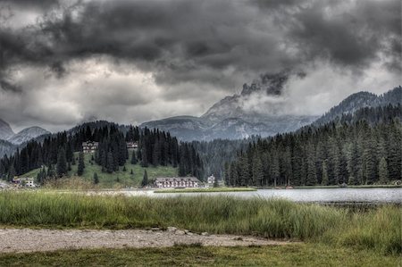 Misurina lake, Dolomites, Italy. The lake is famous for its beautiful views of the Tre Cime di Lavaredo. Foto de stock - Super Valor sin royalties y Suscripción, Código: 400-06330444