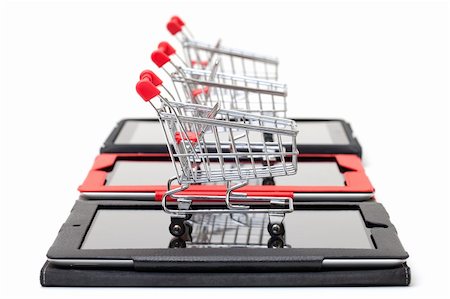 simsearch:400-06484373,k - Shopping Cart over a Tablet PC on white background Stock Photo - Budget Royalty-Free & Subscription, Code: 400-06330480