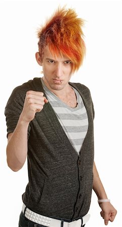 Teen punk with orange mohawk clenches fists Photographie de stock - Aubaine LD & Abonnement, Code: 400-06330524