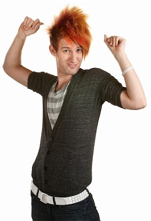 snapping fingers - Teen with orange mohawk snapping fingers Stock Photo - Budget Royalty-Free & Subscription, Code: 400-06330520