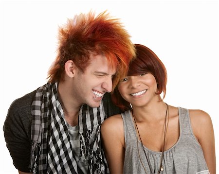 simsearch:400-06330521,k - Giggling young teenage couple over white background Photographie de stock - Aubaine LD & Abonnement, Code: 400-06330538