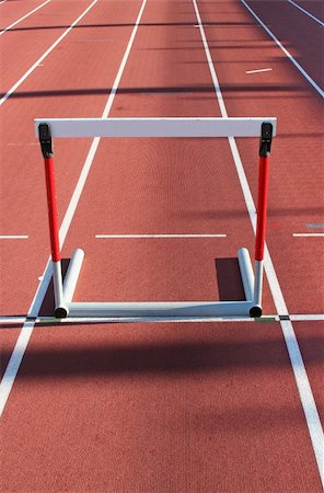 red running tracks with three hurdles set up for training Stock Photo - Budget Royalty-Free & Subscription, Code: 400-06330682