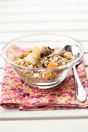 simsearch:400-05735704,k - Close-up of healthy muesli with dried fruit for breakfast Photographie de stock - Aubaine LD & Abonnement, Code: 400-06330993