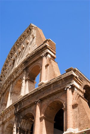 Detail of th Colosseum against blue sky Stock Photo - Budget Royalty-Free & Subscription, Code: 400-06331081