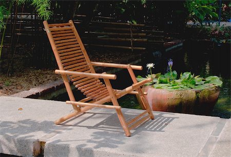 relax chair in the garden Foto de stock - Super Valor sin royalties y Suscripción, Código: 400-06331306