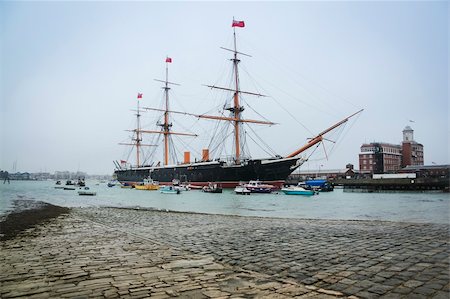 portsmouth - hms warrior english navy victorian iron hulled war ship built in 1860 in the royal naval dockyards portsmouth england Stock Photo - Budget Royalty-Free & Subscription, Code: 400-06331546