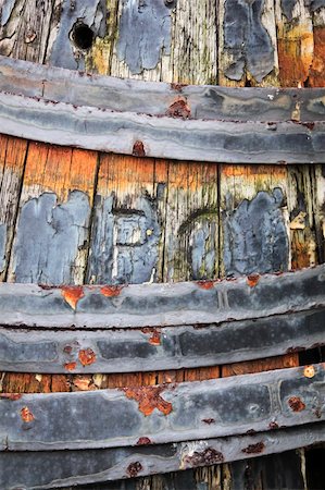 rusting metal hoops on decayed old wooden barrel Stock Photo - Budget Royalty-Free & Subscription, Code: 400-06331547