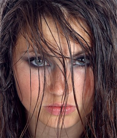 Close-up portrait of young woman. Stockbilder - Microstock & Abonnement, Bildnummer: 400-06331724