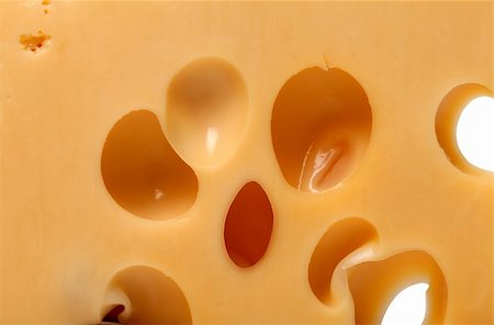 emmentaler cheese - Slice of cheese close-up view Stock Photo - Budget Royalty-Free & Subscription, Code: 400-06332309