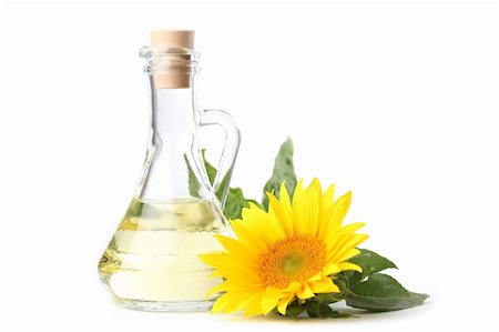 simsearch:400-04714958,k - Glass bottle with sunflower oil and a sunflower isolated on white background Foto de stock - Super Valor sin royalties y Suscripción, Código: 400-06332371