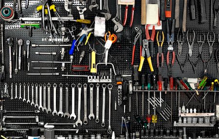 Black wall with many tools in workshop Photographie de stock - Aubaine LD & Abonnement, Code: 400-06332496