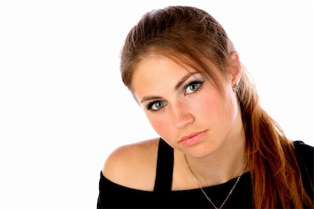 Portrait of a young woman against white background. Stockbilder - Microstock & Abonnement, Bildnummer: 400-06332779