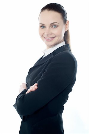 Closeup shot of successful businesswoman posing with crossed arms Stock Photo - Budget Royalty-Free & Subscription, Code: 400-06333716