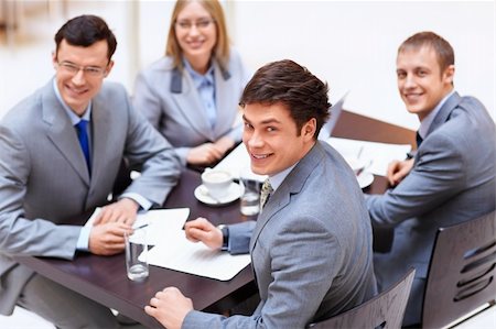 simsearch:400-05669026,k - Business people in a suit at the office Stock Photo - Budget Royalty-Free & Subscription, Code: 400-06355511