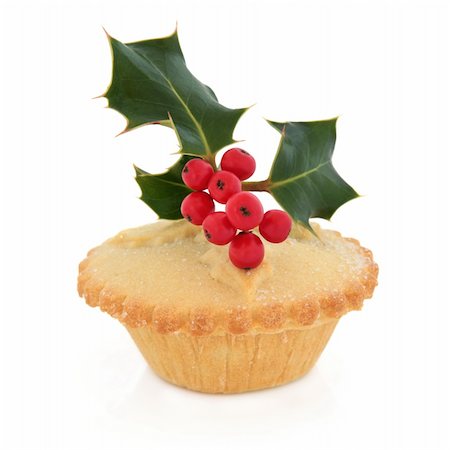 Christmas mince pie with holly and red berry leaf sprig over white background. Stock Photo - Budget Royalty-Free & Subscription, Code: 400-06356076