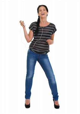 Full length portrait of happy girl with headphones dancing Stock Photo - Budget Royalty-Free & Subscription, Code: 400-06358510