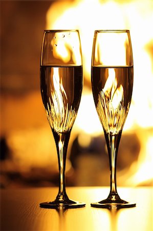 two glasses in front of fireplace Stock Photo - Budget Royalty-Free & Subscription, Code: 400-06359137