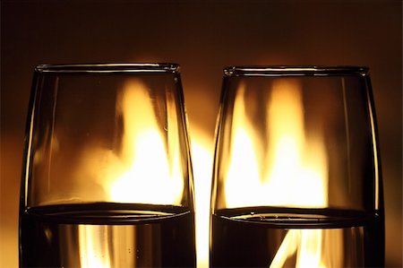 two glasses in front of fireplace Stock Photo - Budget Royalty-Free & Subscription, Code: 400-06359139