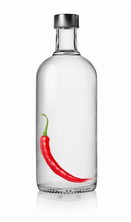 Bottle of vodka with pepper isolated on a white background. Clipping Path Photographie de stock - Aubaine LD & Abonnement, Code: 400-06359270