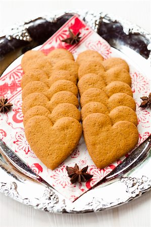 Close-up of delicious heart shape Christmas gingerbread cookies on a plate Stock Photo - Budget Royalty-Free & Subscription, Code: 400-06359395