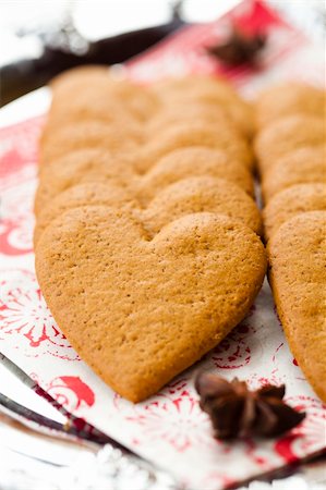 Close-up of delicious heart shape Christmas gingerbread cookies on a plate Stock Photo - Budget Royalty-Free & Subscription, Code: 400-06359396