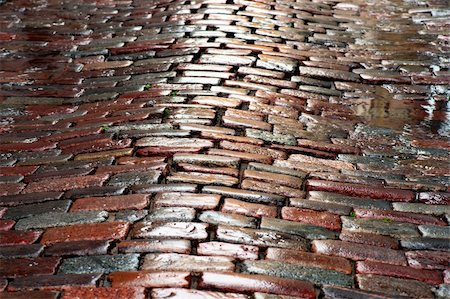 puddle street - background of wet cobble stones with puddles Stock Photo - Budget Royalty-Free & Subscription, Code: 400-06359478