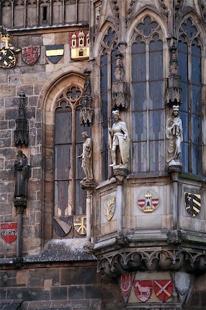 Closeup of Prague Town Hall window with sculptures and arms, Czech Republic Stock Photo - Budget Royalty-Free & Subscription, Code: 400-06364921