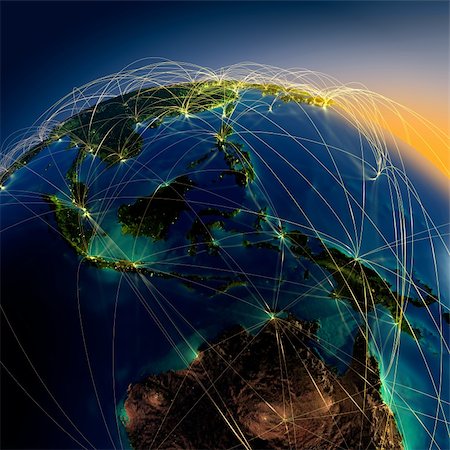 simsearch:400-06363454,k - Highly detailed planet Earth at night with embossed continents, illuminated by light of cities, translucent and reflective ocean. Earth is surrounded by a luminous network, representing the major air routes based on real data Photographie de stock - Aubaine LD & Abonnement, Code: 400-06365234