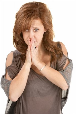 simsearch:400-06365837,k - Anxious woman with hands together near her mouth Stockbilder - Microstock & Abonnement, Bildnummer: 400-06365366