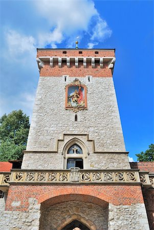 Krakow,  Polish Republic. The famous old Florianska tower Stock Photo - Budget Royalty-Free & Subscription, Code: 400-06365479