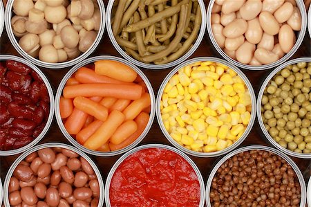 Different kinds of vegetables such as corn, peas and tomatoes in cans Stock Photo - Budget Royalty-Free & Subscription, Code: 400-06365518