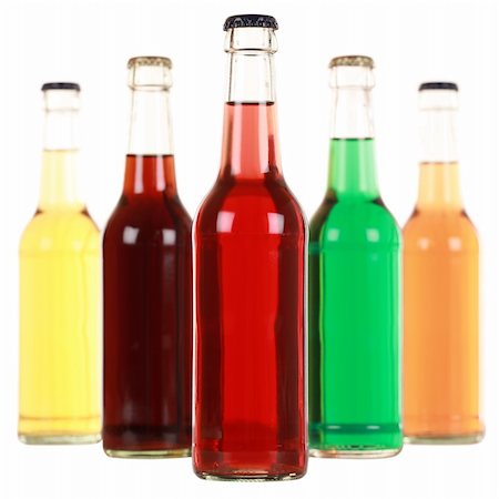 Several bottles with soda isolated on white background Stock Photo - Budget Royalty-Free & Subscription, Code: 400-06365535