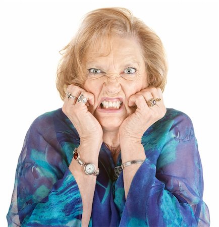 Furious elderly woman with hands on face Stock Photo - Budget Royalty-Free & Subscription, Code: 400-06365838