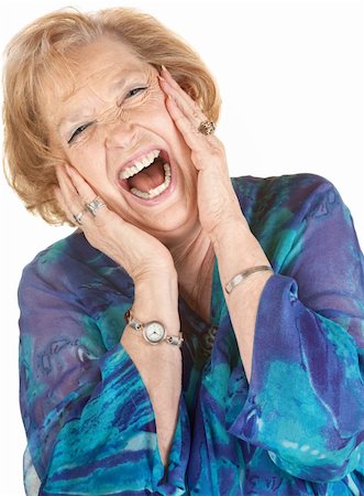 simsearch:400-06365837,k - Blond elderly woman yelling with hands on her cheeks Stockbilder - Microstock & Abonnement, Bildnummer: 400-06365840