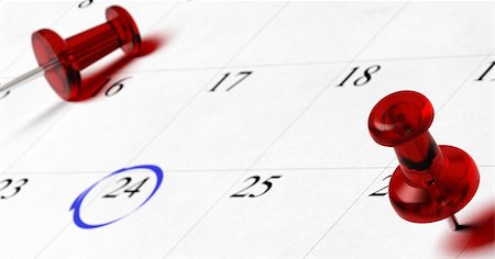 simsearch:400-04777485,k - agenda with red pupins pointing on different dates with blur effect, number 24 is surounded by a blue circle Fotografie stock - Microstock e Abbonamento, Codice: 400-06365911