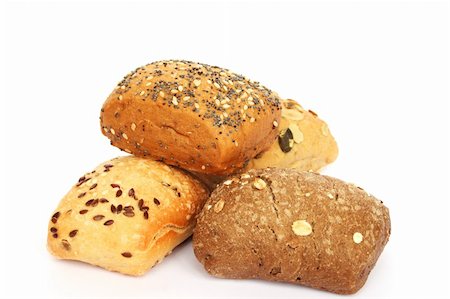 people eating bagels - Breads with different seeds isolated on white background. Photographie de stock - Aubaine LD & Abonnement, Code: 400-06365931