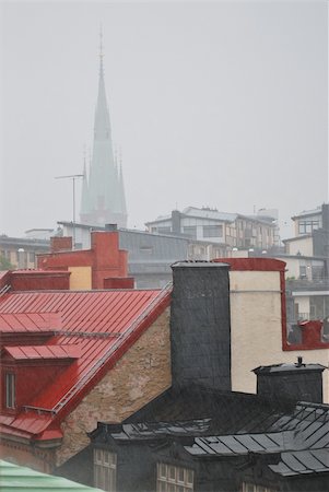 rain on roof - Stockholm in a rainy day with the silhouette of St.Klara on the background Stock Photo - Budget Royalty-Free & Subscription, Code: 400-06366082