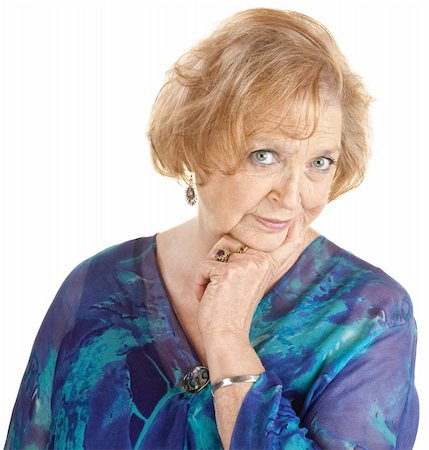 elderly characters - Curious mature woman with finger on cheek over white background Stock Photo - Budget Royalty-Free & Subscription, Code: 400-06366249
