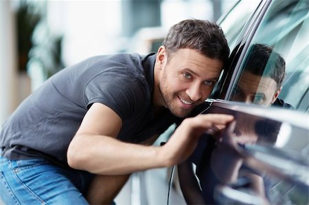 driving new car - The young man at the machine Stock Photo - Budget Royalty-Free & Subscription, Code: 400-06366586