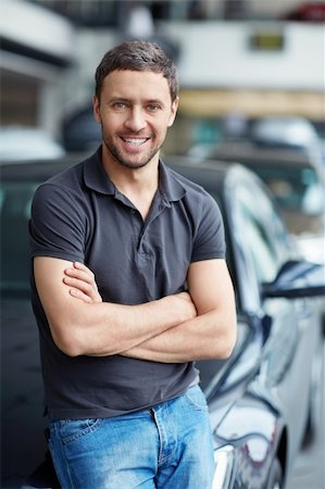 Young man next to the car Stock Photo - Budget Royalty-Free & Subscription, Code: 400-06366589