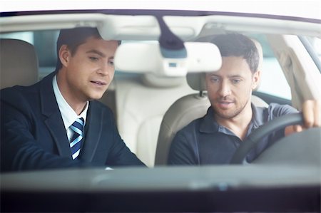 The man in the car with the seller Stock Photo - Budget Royalty-Free & Subscription, Code: 400-06366593