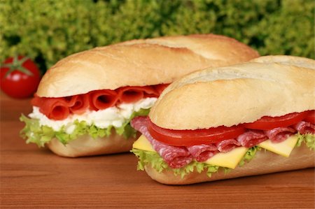 simsearch:400-06421213,k - Fresh sandwiches with lettuce, cheese, salami and smoked salmon Foto de stock - Super Valor sin royalties y Suscripción, Código: 400-06367187