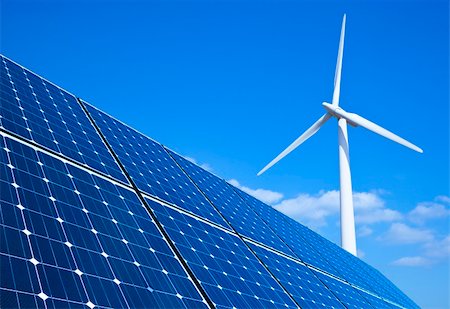 Solar panels and wind turbine against blue sky Stock Photo - Budget Royalty-Free & Subscription, Code: 400-06367484