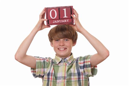 Young boy reminds of first of january Stock Photo - Budget Royalty-Free & Subscription, Code: 400-06367611