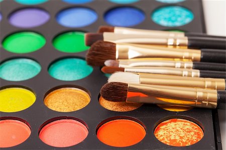 Set of Multicolored Eyeshadows with Brushes, closeup Stock Photo - Budget Royalty-Free & Subscription, Code: 400-06361168