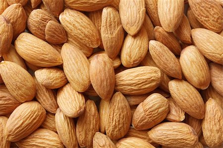 Closeup of many almand nuts as background Stock Photo - Budget Royalty-Free & Subscription, Code: 400-06362862