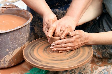 potters hands - hands of a potter Stock Photo - Budget Royalty-Free & Subscription, Code: 400-06363088