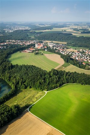 picture of house with high grass - An image of a flight over the bavarian landscape Stock Photo - Budget Royalty-Free & Subscription, Code: 400-06363583