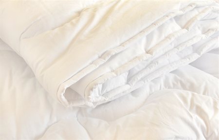 soft blanket texture - white folded cotton duvet background Stock Photo - Budget Royalty-Free & Subscription, Code: 400-06363716