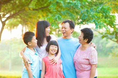 Happy Asian family having conversation at outdoor Stock Photo - Budget Royalty-Free & Subscription, Code: 400-06363754